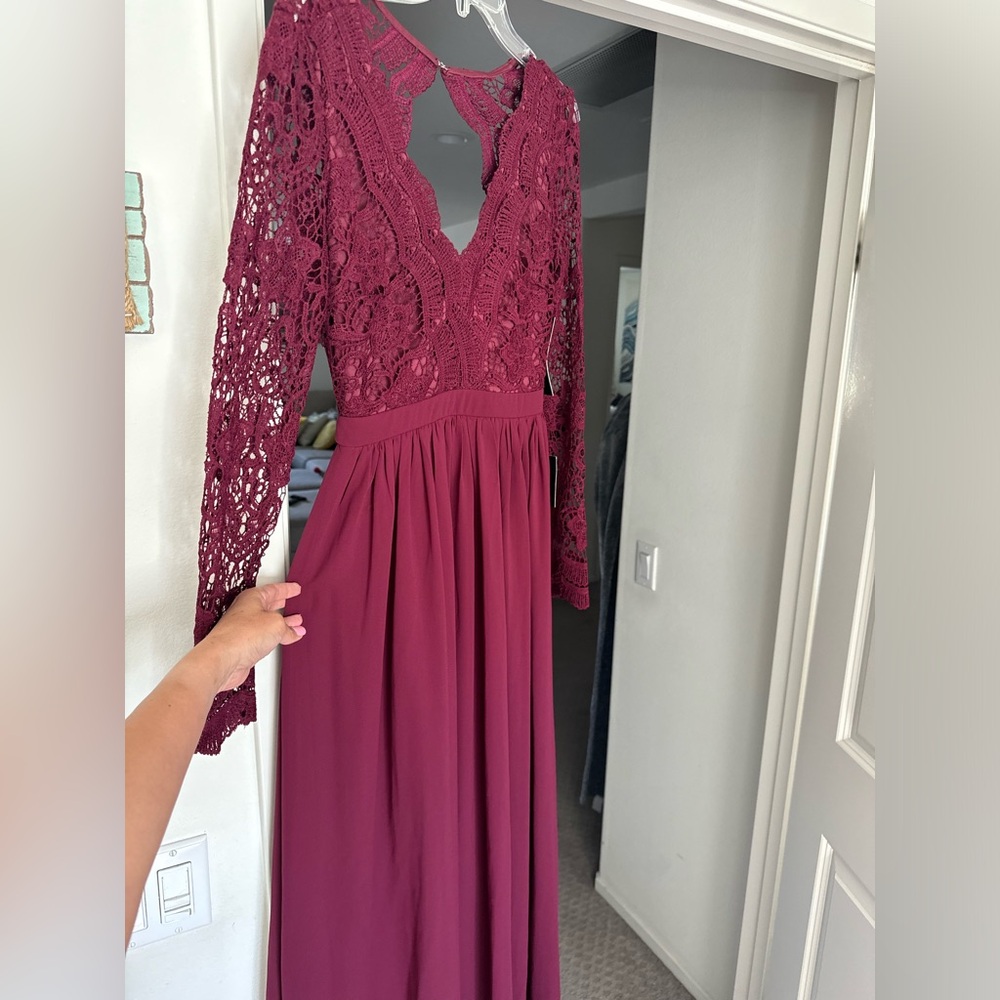 A beautiful burgundy, long sleeve dress